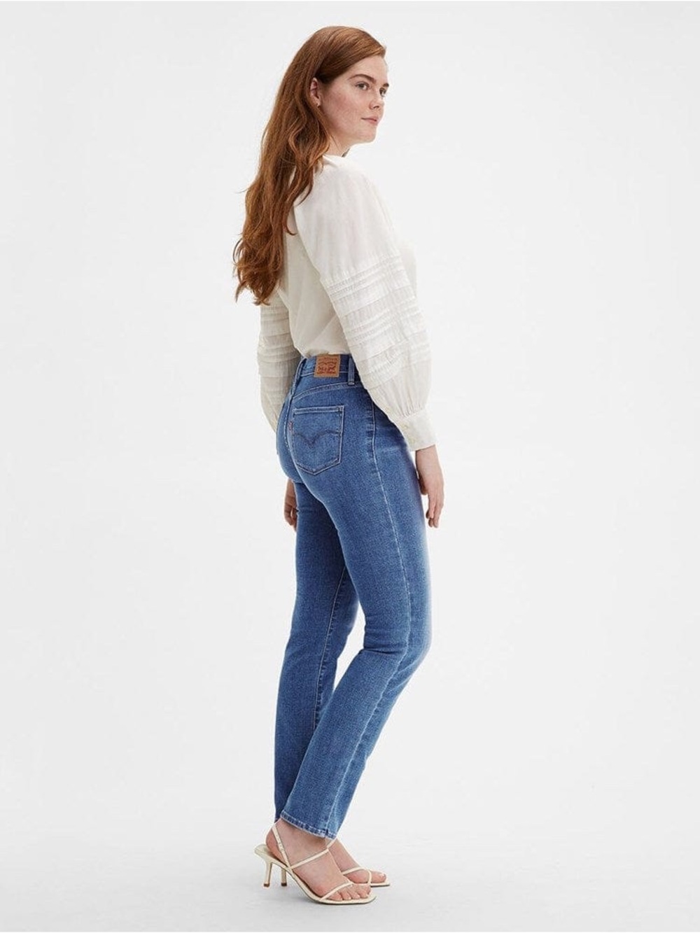 Levi's 312 Shaping Mid-Rise Slim Straight Jeans in Medium Blue